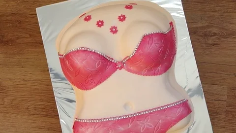 Cake in the shape of torso of woman's body Stock Footage 77245694