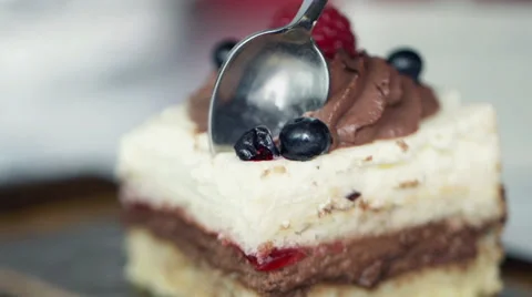 Cake slice with spoon super slow motion 240fps  HD Stock Footage 39611055