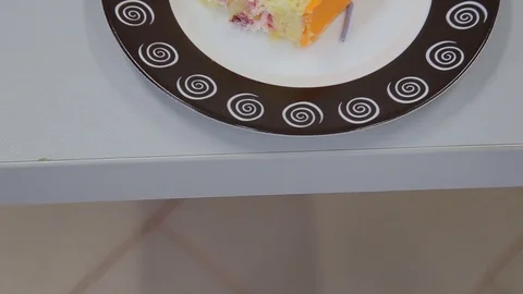 Cake slices on plates Stock Footage 70989772