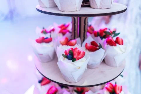 A cake of small cakes close-up. Stock Photos