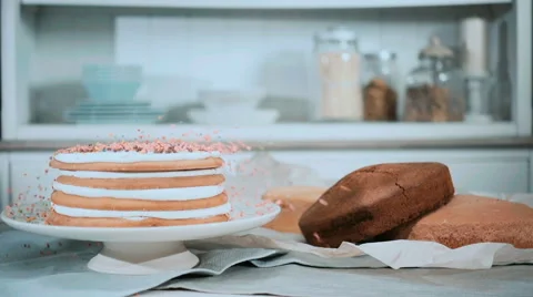 Cake sprinkled with colored sprinkles Stock Footage 68721199