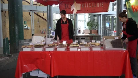 Cake stand At Borough Market near London Bridge, London, UK stock footage Stock Footage