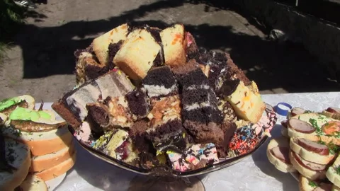 Cake Stand filled with a mountain of various desserts Stock-Footage 327870272