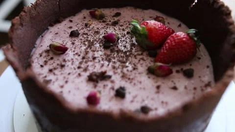 Cake with strawberries and dark shortbread Stock Footage 142492411