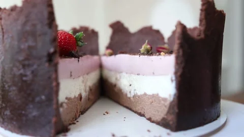 Cake with strawberries and dark shortbread Stock Footage 142492503