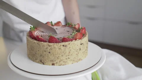 Cake, strawberry cheesecake made from fresh strawberries, on a white surface. On Stock Footage 130208024