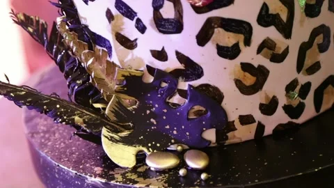 The cake in the style of leopard Stock Footage 130737978