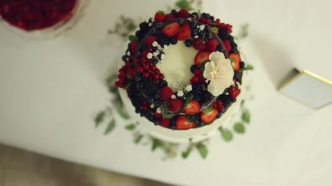 Cake on a table Stock Footage 268047943