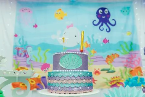 Cake table overview decorated with the seabed theme. Children's party with oc Stock Photos