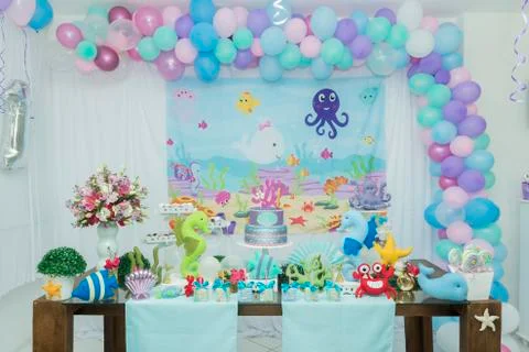 Cake table overview decorated with the seabed theme. Children's party with oc Stock Photos