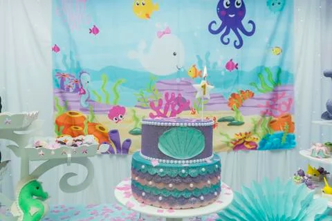 Cake table overview decorated with the seabed theme. Children's party with oc Stock Photos