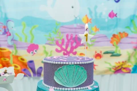 Cake table overview decorated with the seabed theme. Children's party with oc Stock Photos