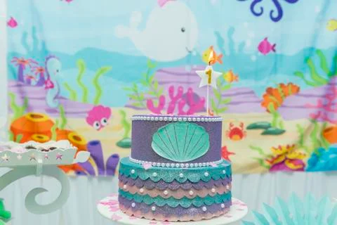 Cake table overview decorated with the seabed theme. Children's party with oc Stock Photos