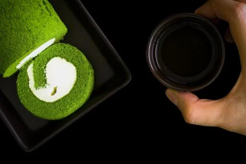 Cake with Tea Background / Cake with Tea / Cake with Tea on Black Background Stock Photos