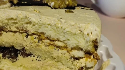 Cake texture in a close-up cut. Cake of cakes and cream with milk cream Stock Footage 324782100