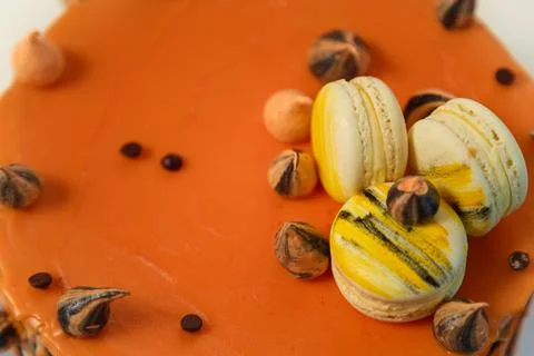 Cake with tiger stripes pattern and macaroons for man or boy. Sweet pastry Stock Photos