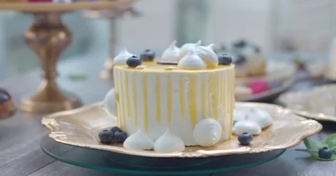 Cake on the yellow plate spinning Stock Footage 75235328