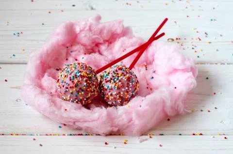 Cakepops in the nest made from candy-floss Stock Photos