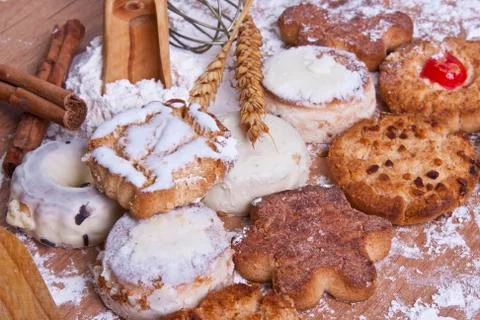 Cakes and sweets in the kitchen table Stock Photos