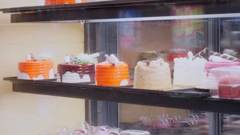 Cakes and Sweets in a Window of a Cafe Stock Footage 304131162