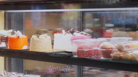 Cakes and Sweets in a Window of a Cafe Video stock 304131356