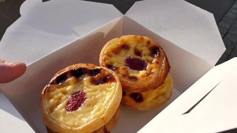 Cakes bought at the bakery for two. romantic breakfast_pastel de nata Stock Footage 305603780