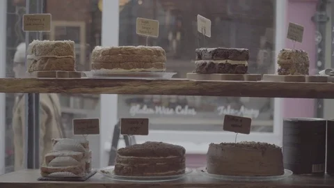 Cakes In Cafe Window Stock Footage 81387993
