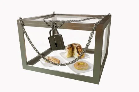 Cakes in close metal box with chains diet concept composition photo Illustrazione stock