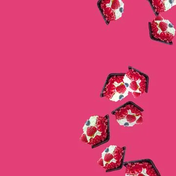 Cakes fall from top to bottom on the right on the pink.Summer sweet flat flay 스톡 사진