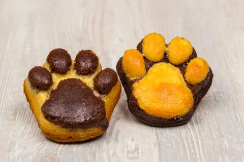 Cakes in the form of a trace on the table Stock Photos