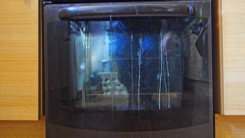 Cakes in oven Stock Footage 127305960