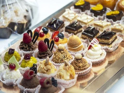Cakes in the store window . Stock Photos