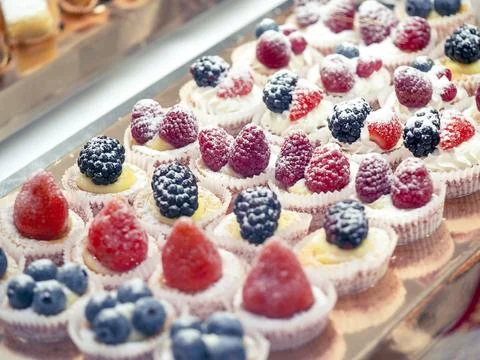 Cakes in the store window . Stock Photos