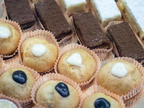 Cakes in the store window . Stock Photos