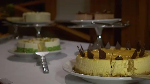 Cakes on wedding dessert table. Close up. Stock Footage 149075769