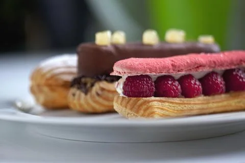 Cakes on a white plate Stock Photos