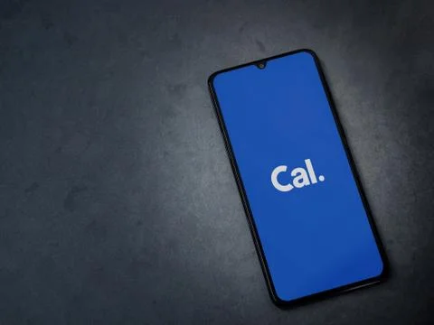 Cal app launch screen with logo on the display of a black mobile smartphone o Stock Photos