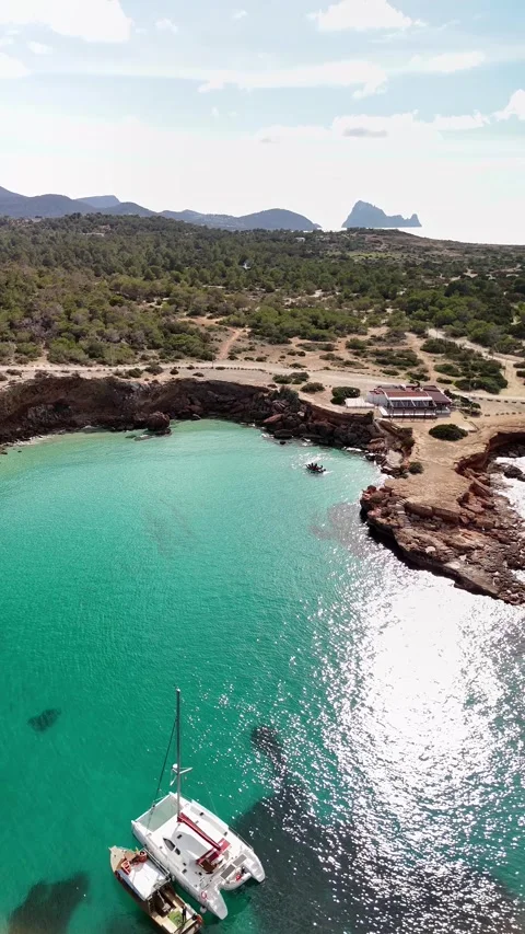 Cala Comte beach. In the background you can see the island of Es Vedra. Stock Footage 302101781