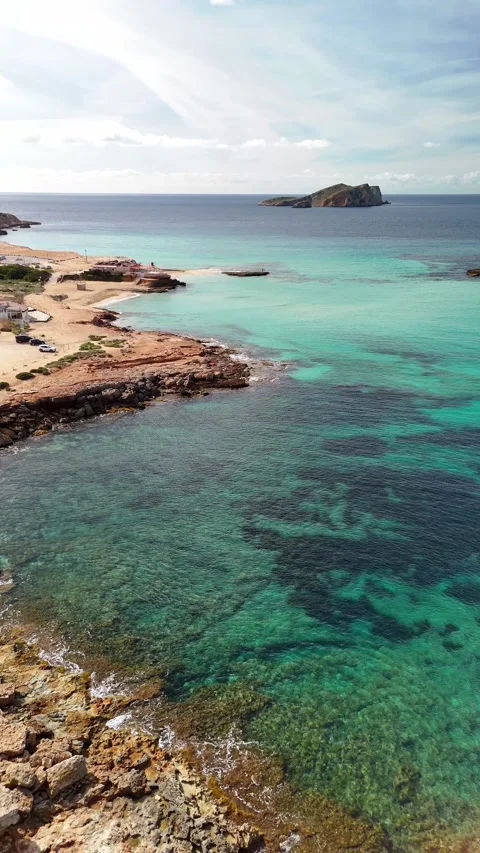 Cala Comte beach, in Ibiza. Incredible waters surrounded by nature. Stock Footage 302101320