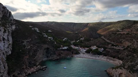 Cala Granadella bay cliffs white limestone enclosed cove Javea Vidéo 336642897