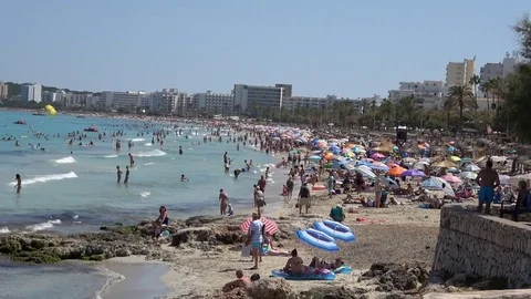 Cala Millor Mallorca Spain: Busy coastline with many tourists on the beach 動画素材 81047375