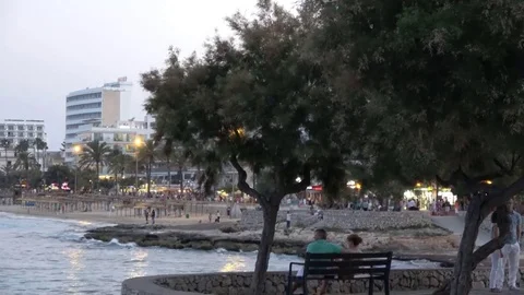 Cala Millor Mallorca Spain: People watching the coastline and beach in the Video stock 81069287