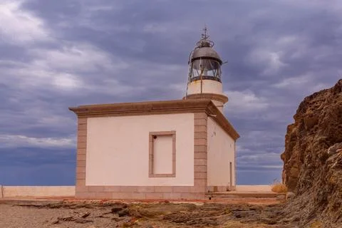 Cala Nans Lighthouse in Cadaques, Spain Stock Photos
