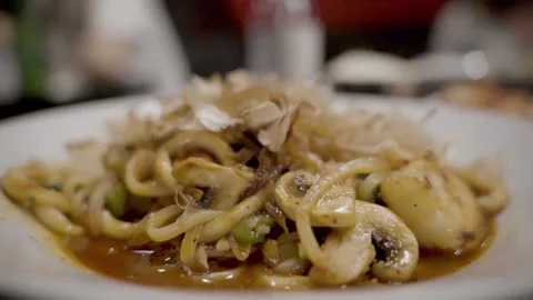 Calamari Bukom Close up Pan left Williamsburg Brooklyn NYC 4k Stock Footage 274844331