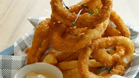 Calamari ring with lemon - fried squid Stock-Footage 77567651
