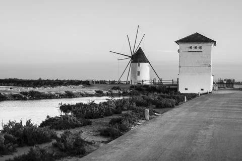 The Calcetera Mill between salt ponds in San Pedro del Pinatar town Stock Photos
