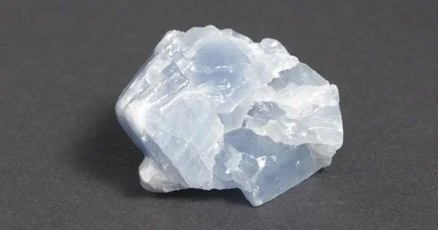 Calcite blue close-up on dark background. Rotation. Video stock 164286644