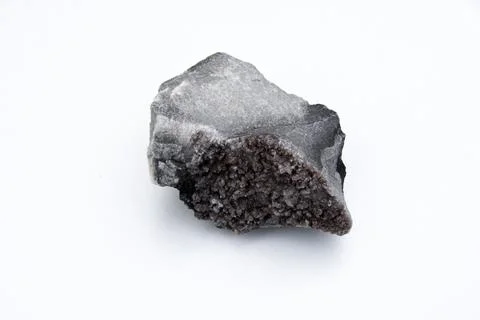 Calcite on a rock over white background Stock Photos