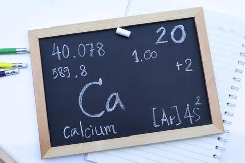 Calcium and symbol structural formula chemical on the blackboard 写真素材
