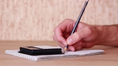 Calculating and writing costs Vídeo Stock 83533576